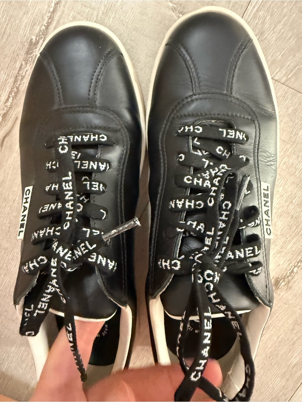 CHANEL Black and White Logo Lace-Up Leather Sneakers